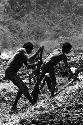 Samuel Putnam negatives, New Guinea; men working in a ditch