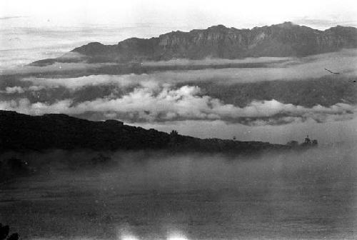 Samuel Putnam negatives, New Guinea.  Early morning; mist in valley.