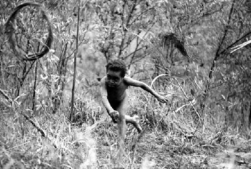 Samuel Putnam negatives, New Guinea; Tukom has just thrown a hoop