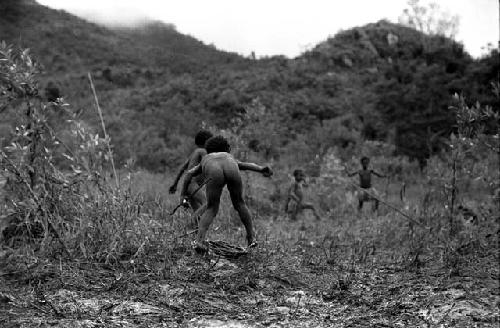 Samuel Putnam negatives, New Guinea; boys playing sikoko wasin