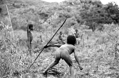 Samuel Putnam negatives, New Guinea; boys playing sikoko wasin