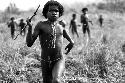 Samuel Putnam negatives, New Guinea;young warrior running with a spear