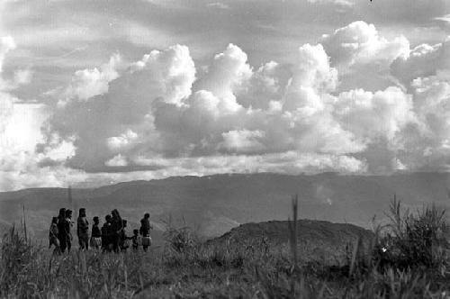 Samuel Putnam negatives, New Guinea; women dancing on Liberek; Siobara in bkgd; high beautiful clouds