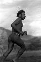 Samuel Putnam negatives, New Guinea; man runs