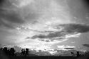 Samuel Putnam negatives, New Guinea; late light; silhouetted figures