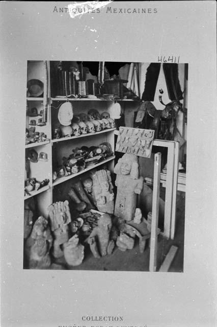 Collection of various artifacts - all types, all materials. Caption reads: "Collection Eugéne Boban Duvergé, Paris." Commercialized (?) studio photo of someone's shop/collection of Mexican artifacts, in Paris.
