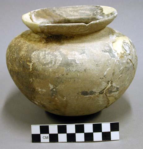 Restorable black on white pottery jar - contained sulphur crystals