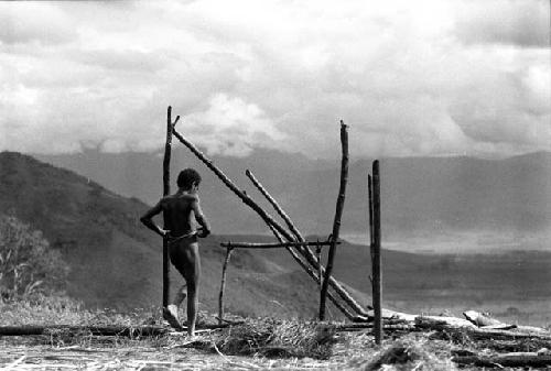 Samuel Putnam negatives, New Guinea; up on the Tukumba; a place where wood is gathered; a boy stands near it