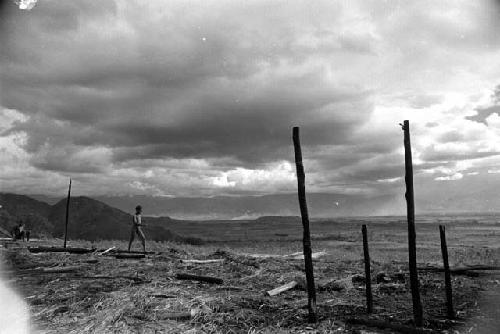 Samuel Putnam negatives, New Guinea; up on the Tukumba; a place where wood is gathered; a boy stands