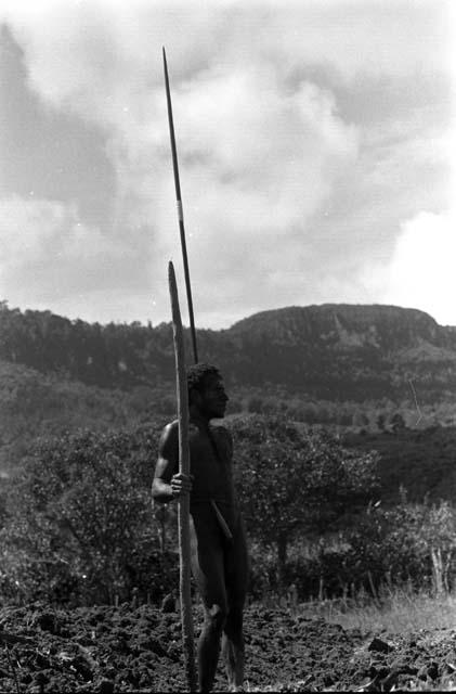 Samuel Putnam negatives, New Guinea; Tue working in a garden