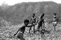 Samuel Putnam negatives, New Guinea; boys playing sikoko wasin; Isile and Okal