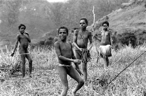 Samuel Putnam negatives, New Guinea; boys playing sikoko wasin; Isile and Okal