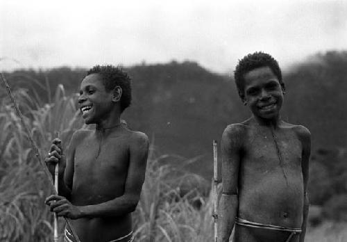 Samuel Putnam negatives, New Guinea; twins- Isile and Okal; one is looking at the camera
