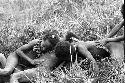 Samuel Putnam negatives, New Guinea; boys rolling on the ground