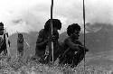 Samuel Putnam negatives, New Guinea; men watching the battle on the end of the Warabara