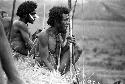 Samuel Putnam negatives, New Guinea; men watching the battle on the end of the Warabara; yelling at the enemy