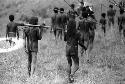 Samuel Putnam negatives, New Guinea; Nilik and Polik and other men walking back towards the Warabara
