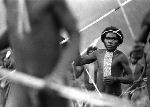 Samuel Putnam negatives, New Guinea; a group of men running towards the battle