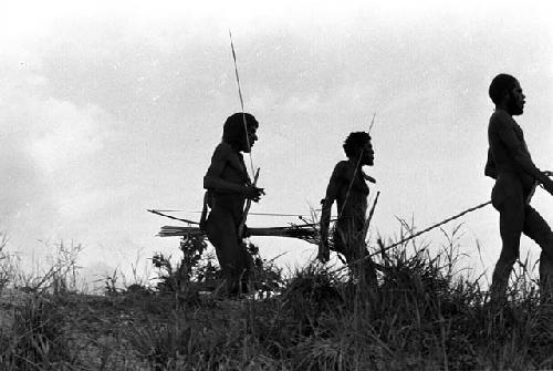 Samuel Putnam negatives, New Guinea; men running; Nilik is one and Yoli