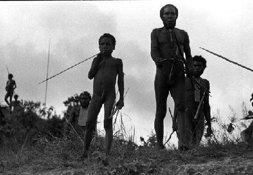 Samuel Putnam negatives, New Guinea; little boys and men watch the battle