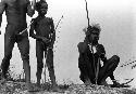 Samuel Putnam negatives, New Guinea; little boys and men watch the battle