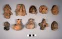 Pottery figures -- 24 human and animal figures and whistles