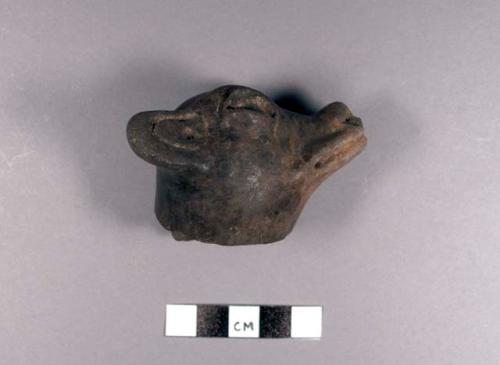 Animal head pottery effigy