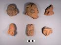14 pottery head effigies