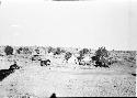 Tents, automobile, wagon and horses at Awatovi