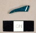 Aqua bottle glass fragment, possibly a lid fragment