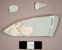 Pearlware sherds, including one base sherd to a plate