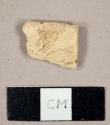 Tin-glazed earthenware sherd, no glaze remaining