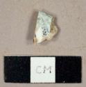 Whiteware rim sherd to a saucer with black transfer print