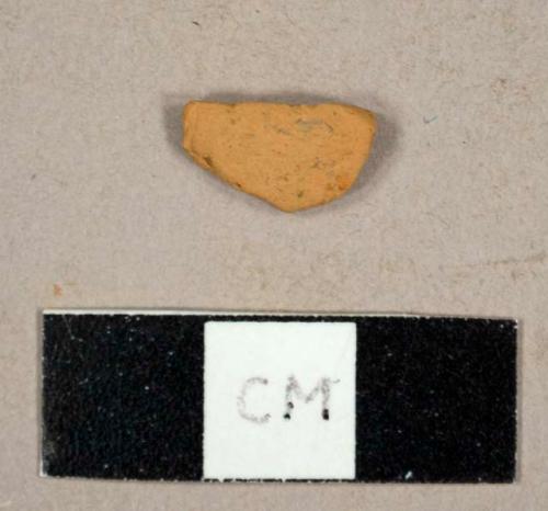 Earthenware sherd with no glaze remaining, possibly tin-glazed earthenware