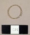 Wire ring with one area cut or broken and a wavy pattern