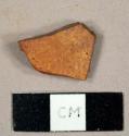 Red Cambridge mudstone?, possibly ceramic