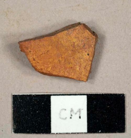 Red Cambridge mudstone?, possibly ceramic