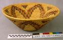 Coiled bowl with flower motif