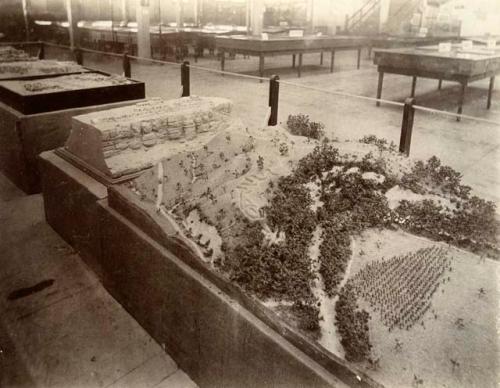 Models of Serpent Mound by W.H. Jackson at  World's Columbian Exposition of 1893 - Peabody Exhibition; model of Cliff Dwellers in background.