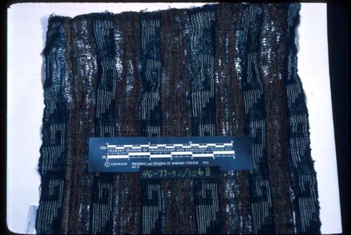 Textile, warp-patterned