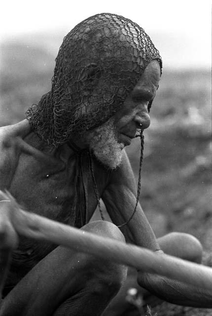 Samuel Putnam negatives, New Guinea; an old man working in the fields