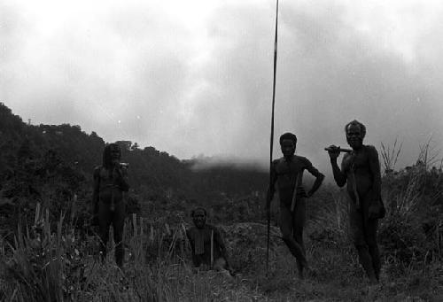 Samuel Putnam negatives, New Guinea; Polik; Alugu and 2 other men standing on the Amelerak