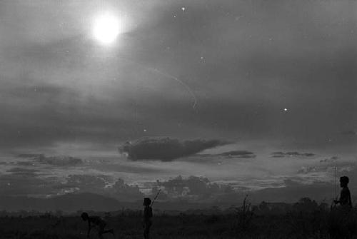 Samuel Putnam negatives, New Guinea; boys playing sikoko wasin from a distance