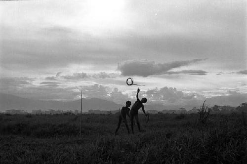 Samuel Putnam negatives, New Guinea; boys spearing a sikoko