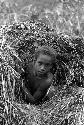 Samuel Putnam negatives, New Guinea; Lokopma playing in grass