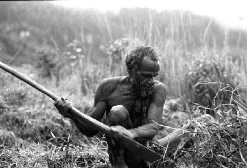 Samuel Putnam negatives, New Guinea; Alugu working in his garden