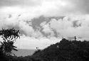 Samuel Putnam negatives, New Guinea; children behind Homaklep watching pigs; clouds behind