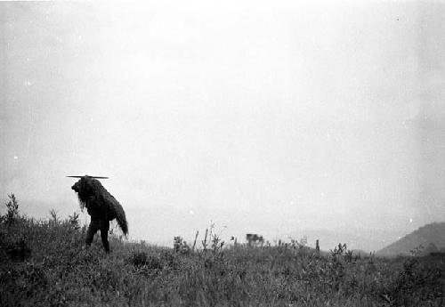 Samuel Putnam negatives, New Guinea; Yege Abu and a little girl standing above Homaklep watching their pigs