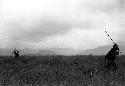 Samuel Putnam negatives, New Guinea; women and children under an olea (garden)