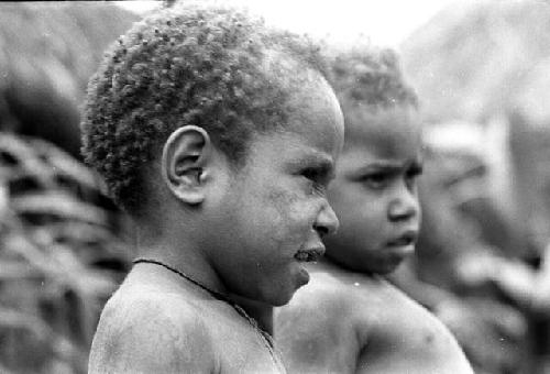 Samuel Putnam negatives, New Guinea; Natorek and Yege Asuk's little boy; portrait